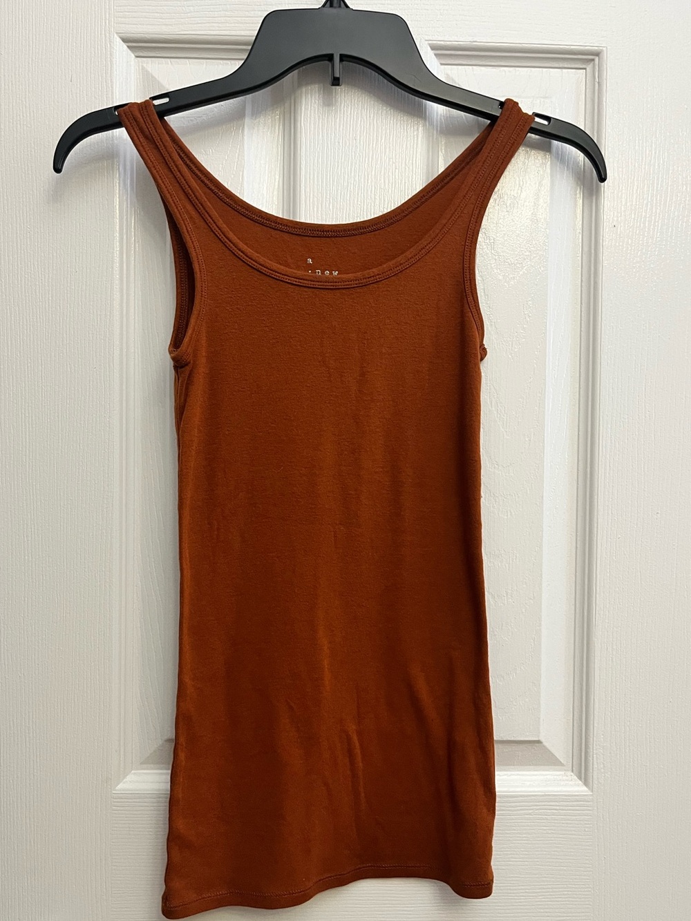 a new day orange tank